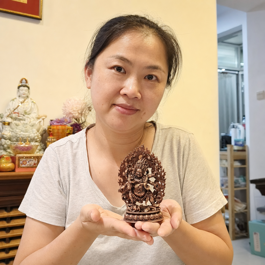 Six-Armed Mahakala Copper Statue for Protection and Courage – 12 cm held in a home