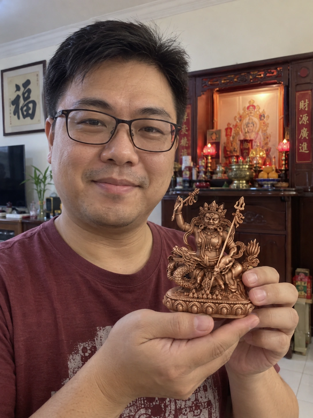 White Jambhala Red Copper Statue – Wealth and Abundance 11 cm held in a home