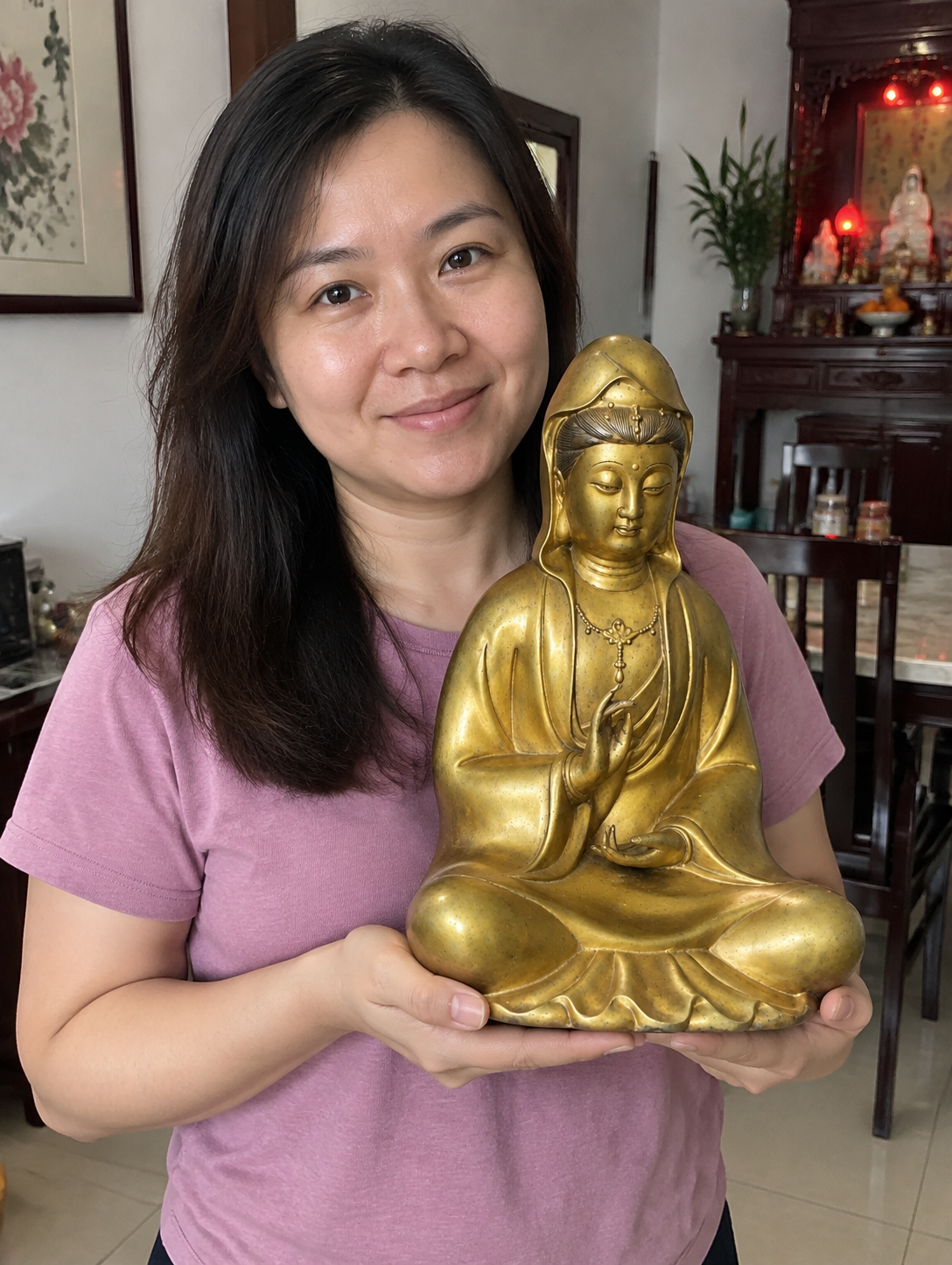 Guanyin 观音菩萨 gilded copper statue in a home